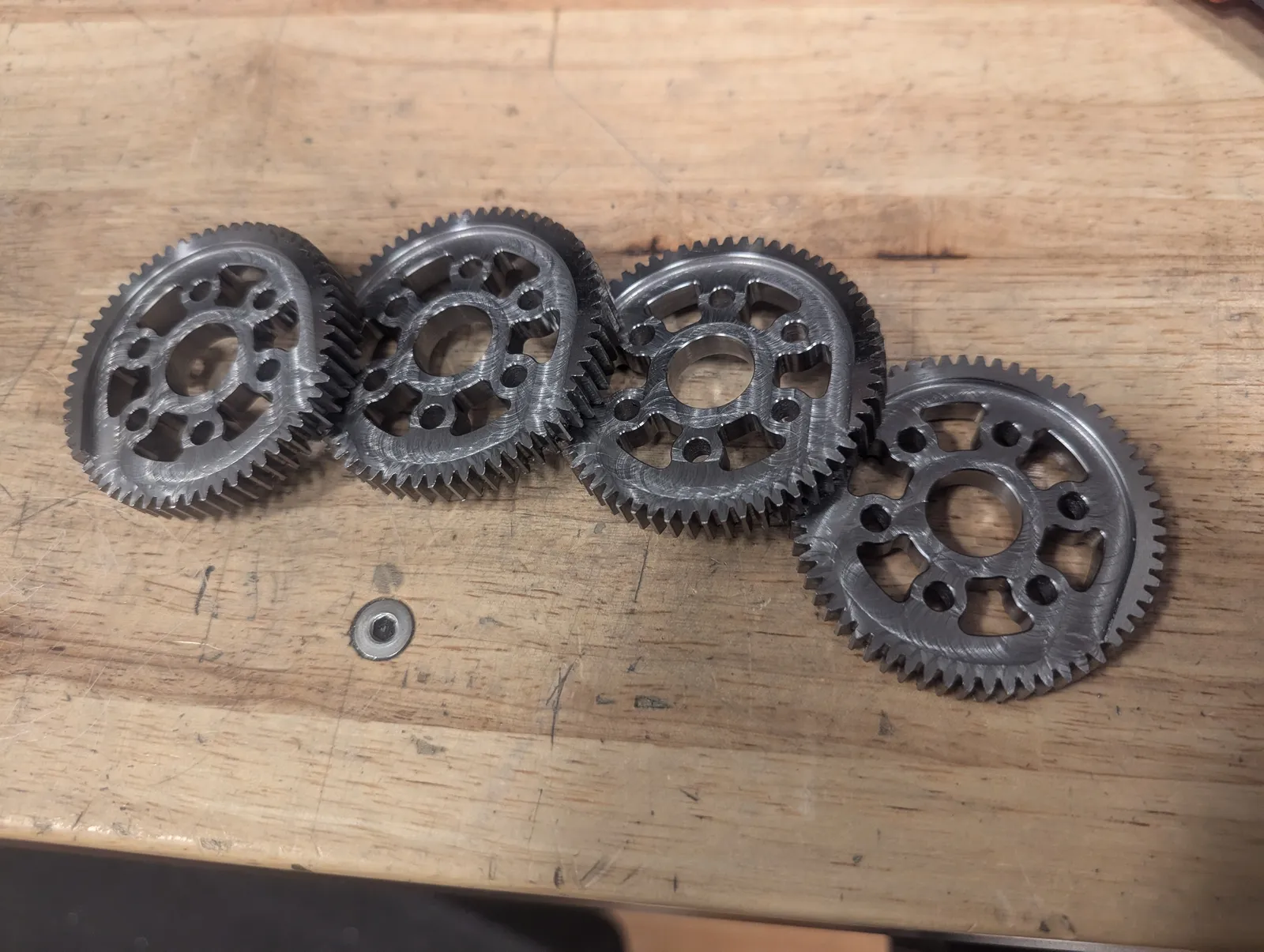 The lifter's output gears were bought on eBay and had custom internal features machined