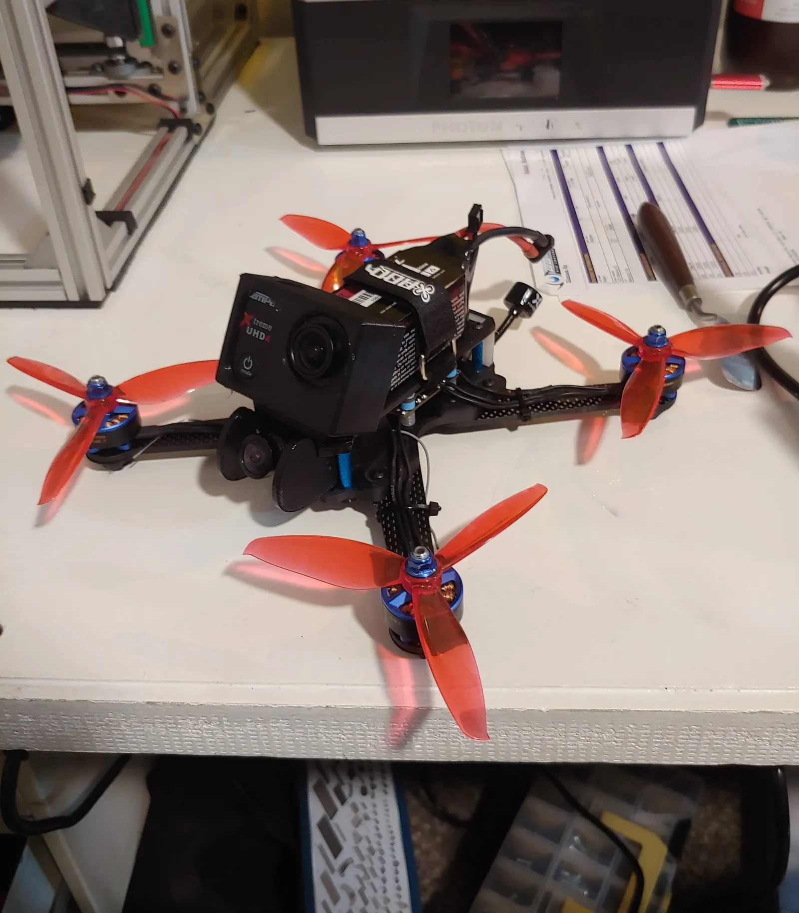 The v2 frame has a TPU mount for an action camera, which allows me to record high quality footage of my flights
