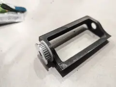Thumbnail: A heat-treated drum with its pulley. The white TPU insert helps reduce shock transfer to the weapon motor