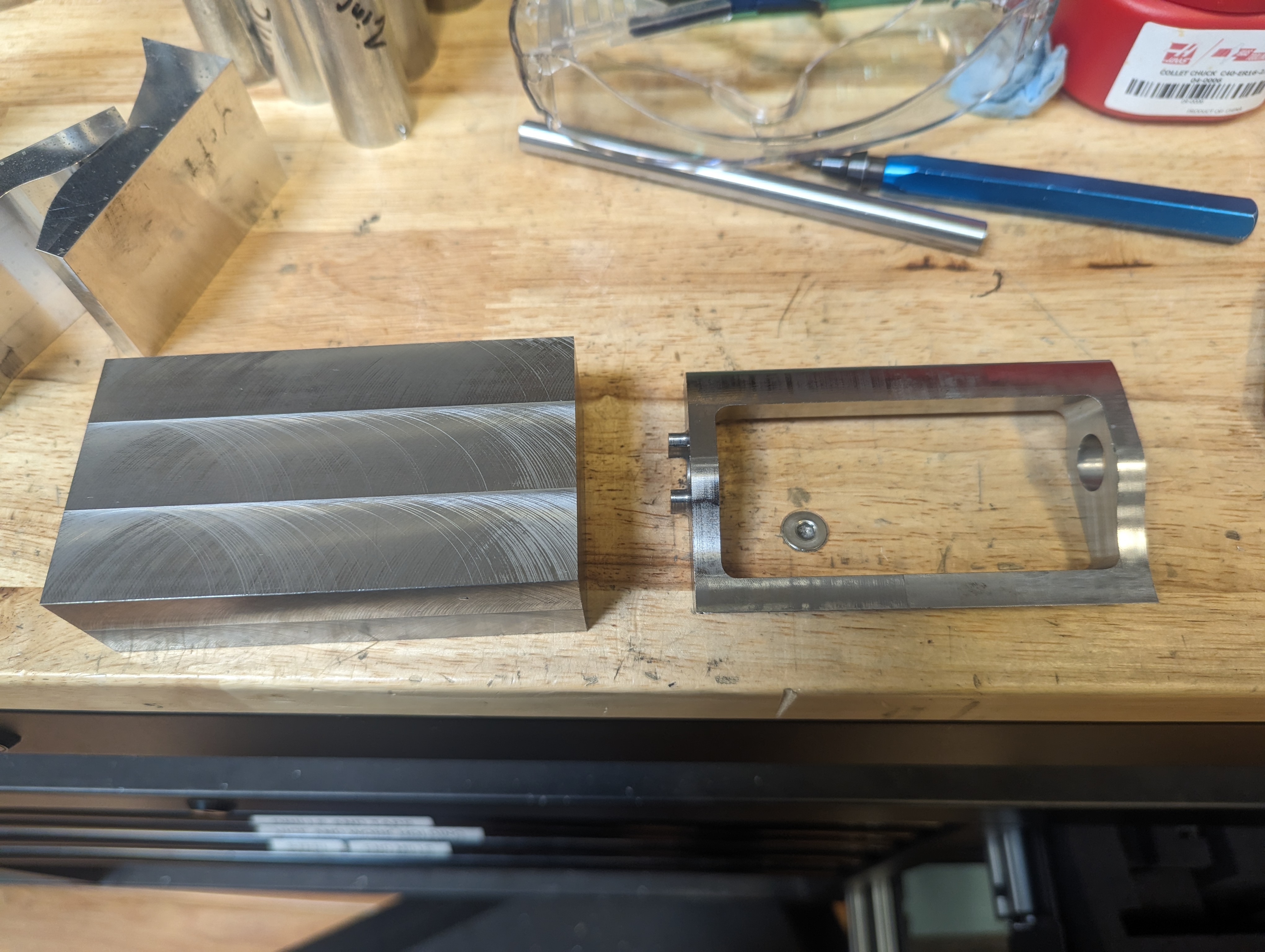 The beater bar (right) was machined from a $10 offcut of S7 tool steel (left)