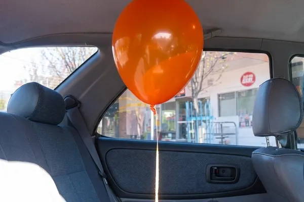 Balloon in a Car