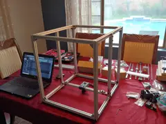 Thumbnail: The build began with the frame, which is made from 2020 aluminum extrusion and COTS brackets