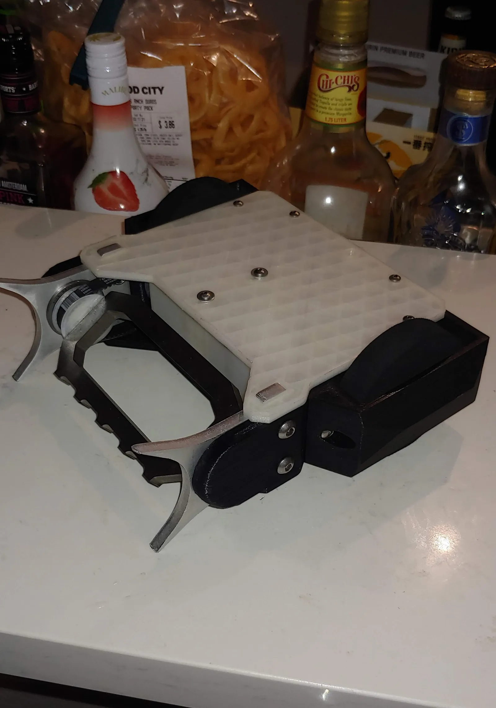 Version 2.0, converted to a 2WD drum spinner with a nylon frame and laser-cut steel beater bar