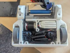 Thumbnail: Internal electronics layout with motors, motor controllers, RC receiver, battery, and power distribution, with foam-wrapping around each board