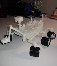 Thumbnail: This Perseverance rover model was one of the first that I made on the custom printer. All the small white pieces used for the various joints and linkages were printed in a single job