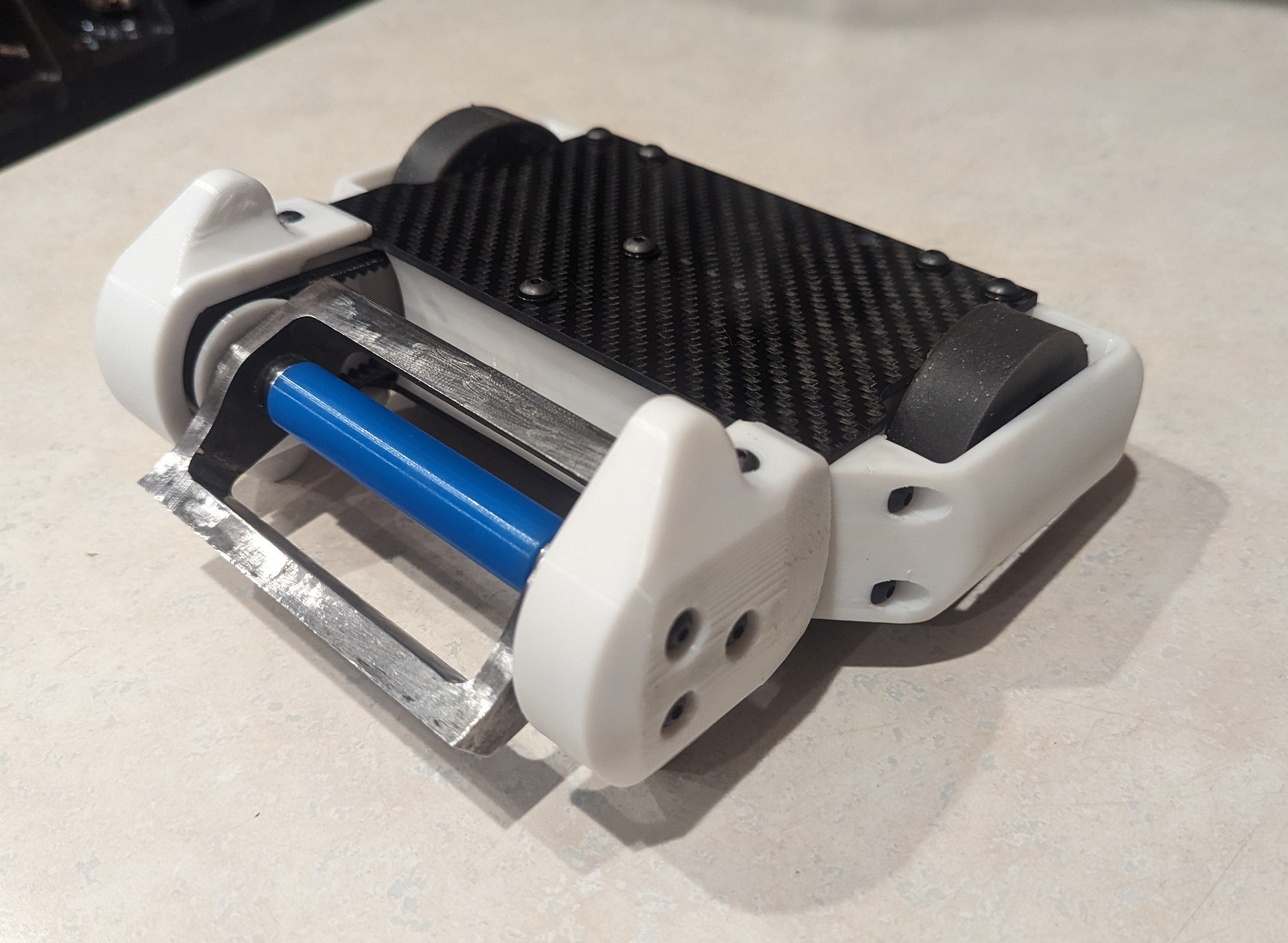 Latest iteration of spinny boiii, with a custom CNC-machined weapon and bulky TPU armor