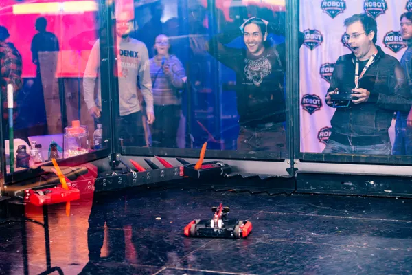 The winning moment of the final fight, with Full Court propped up in the corner of the arena. You can see the shock on my and Caleb's faces as we realized we had won.