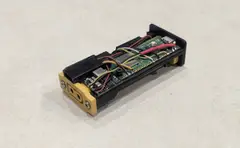 Thumbnail: Front side of Prototype 1 without the outer case, showing the Raspberry Pi Pico W, buck converter, and servo connector on a 3D-printed sled