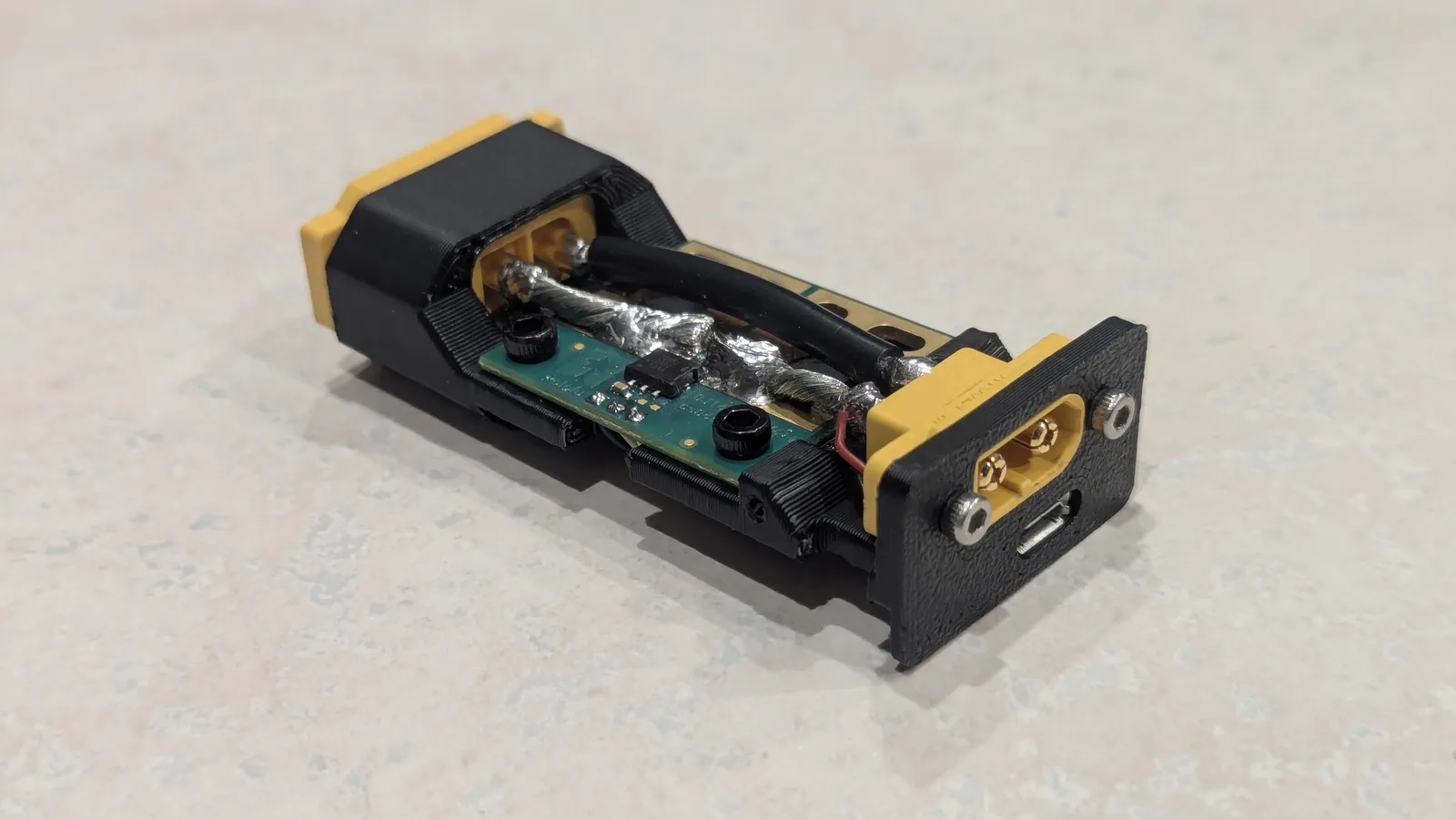 Reverse side of Prototype 1 without the outer case, showing the hall effect current sensor module, and the power connections between XT-60 connectors